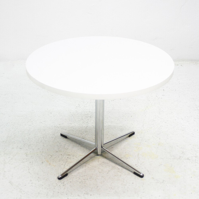 Round coffee table with a white melamine top - 1970s