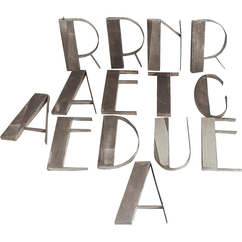 Vintage metal lettering composed of 14 letters, 1930