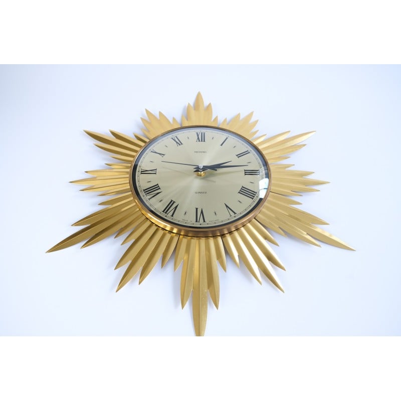 Vintage Starburst wall clock in teak and chrome for Metamec, England 1960