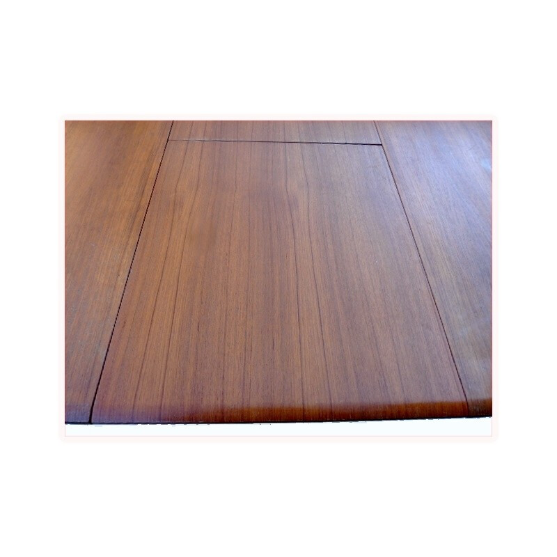 Scandinavian teak dining table with integrated extensions - 1960s