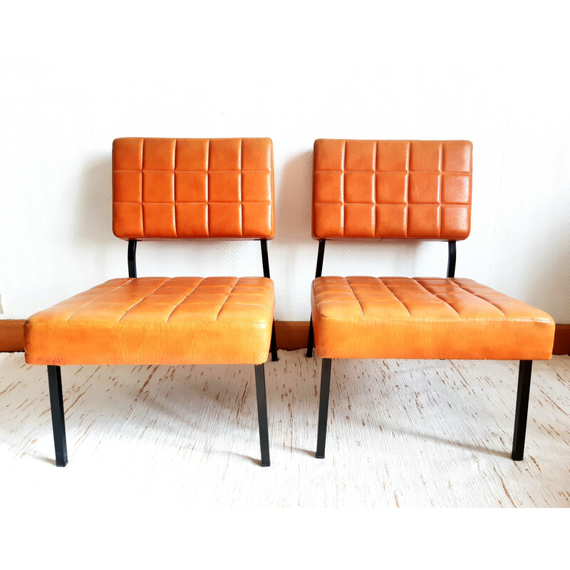 Pair of vintage armchairs in fawn leatherette and black lacquered metal, 1960