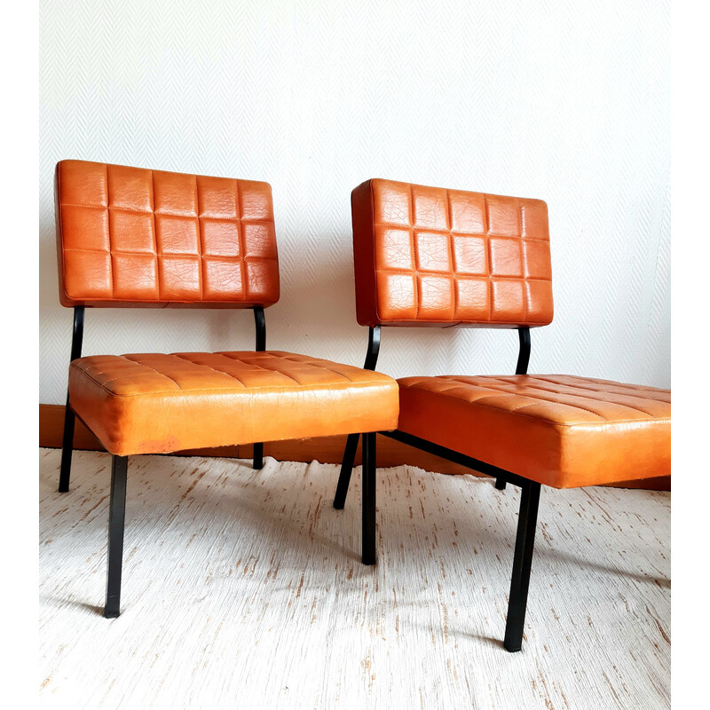 Pair of vintage armchairs in fawn leatherette and black lacquered metal, 1960