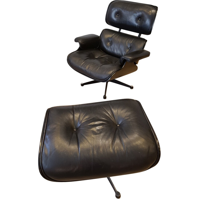 Set of an armchair and ottoman by Charles and Ray Eames produced by Mobilier International - 1980s