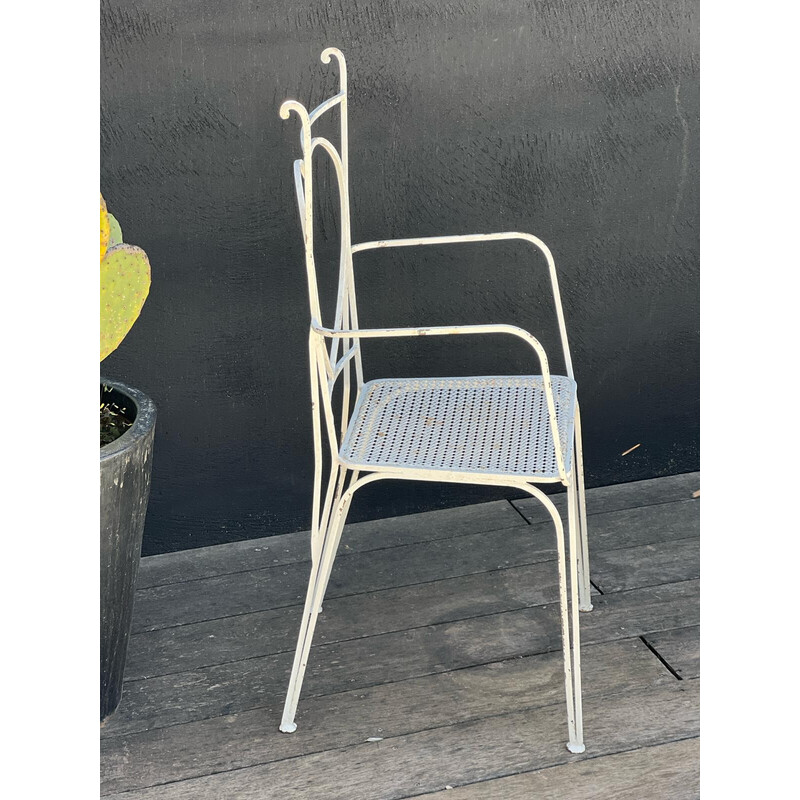 Pair of vintage perforated metal chairs and armchairs by Mathieu Matégot, 1950