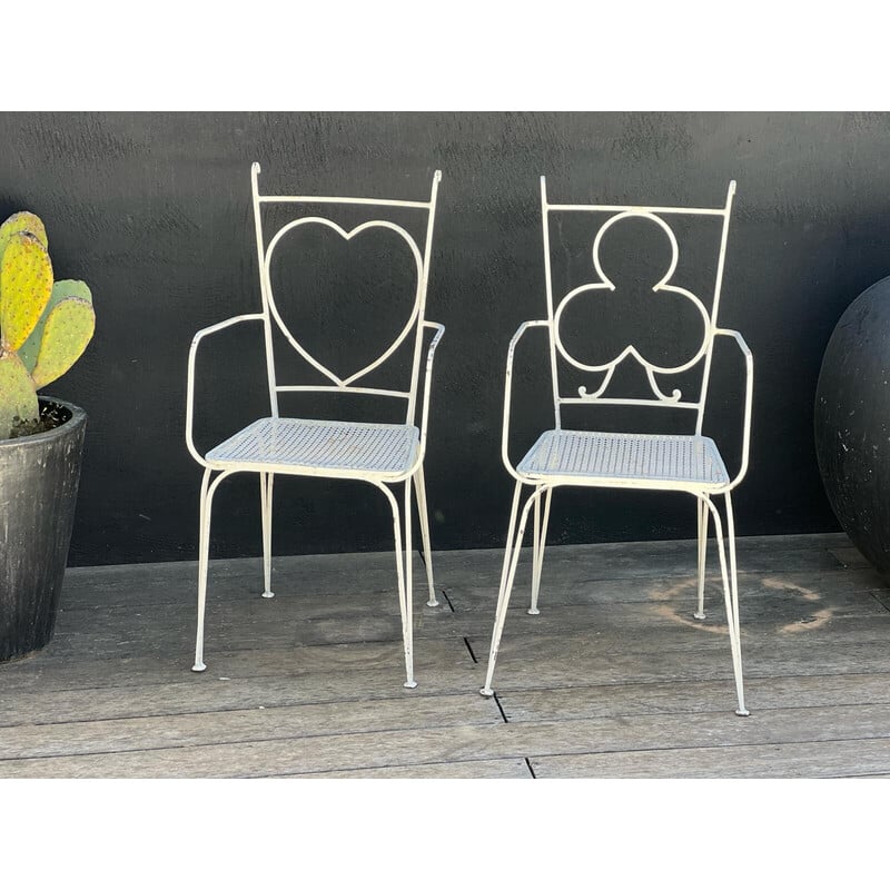 Pair of vintage perforated metal chairs and armchairs by Mathieu Matégot, 1950