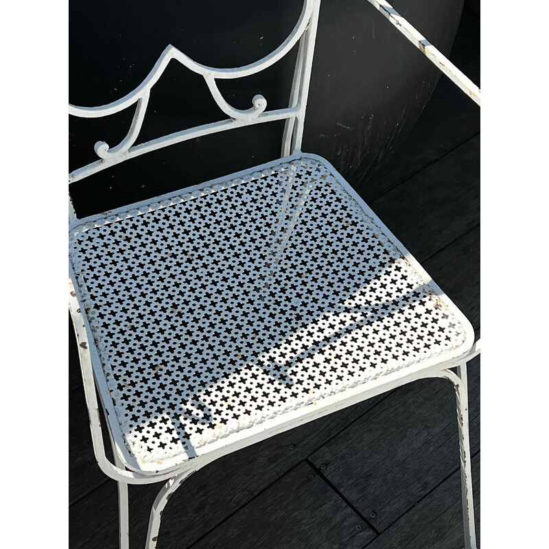 Pair of vintage perforated metal chairs and armchairs by Mathieu Matégot, 1950