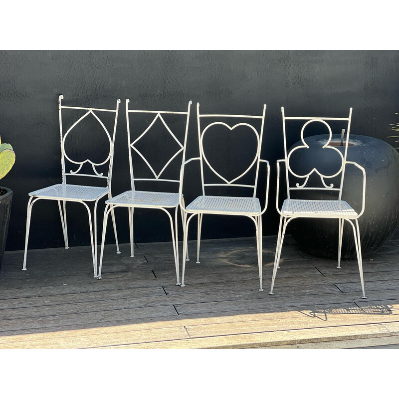 Pair of vintage perforated metal chairs and armchairs by Mathieu Matégot, 1950