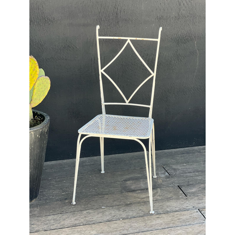 Pair of vintage perforated metal chairs and armchairs by Mathieu Matégot, 1950