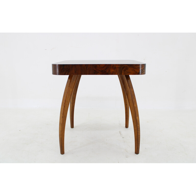 Vintage "Spider" coffee table in solid beech and walnut by Jindrich Halabala, Czechoslovakia 1940