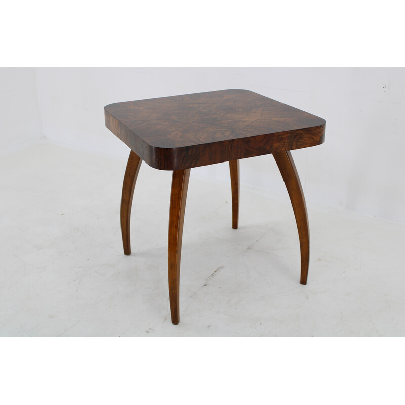 Vintage "Spider" coffee table in solid beech and walnut by Jindrich Halabala, Czechoslovakia 1940