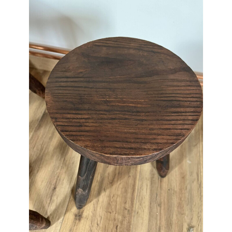 Set of 4 vintage tripod stools covered in cowhide