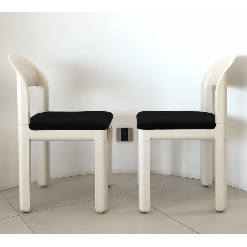 Pair of vintage white plastic and wool chairs by Luigi Massoni and Dino Pelizza for iGuzzini, Italy 1970