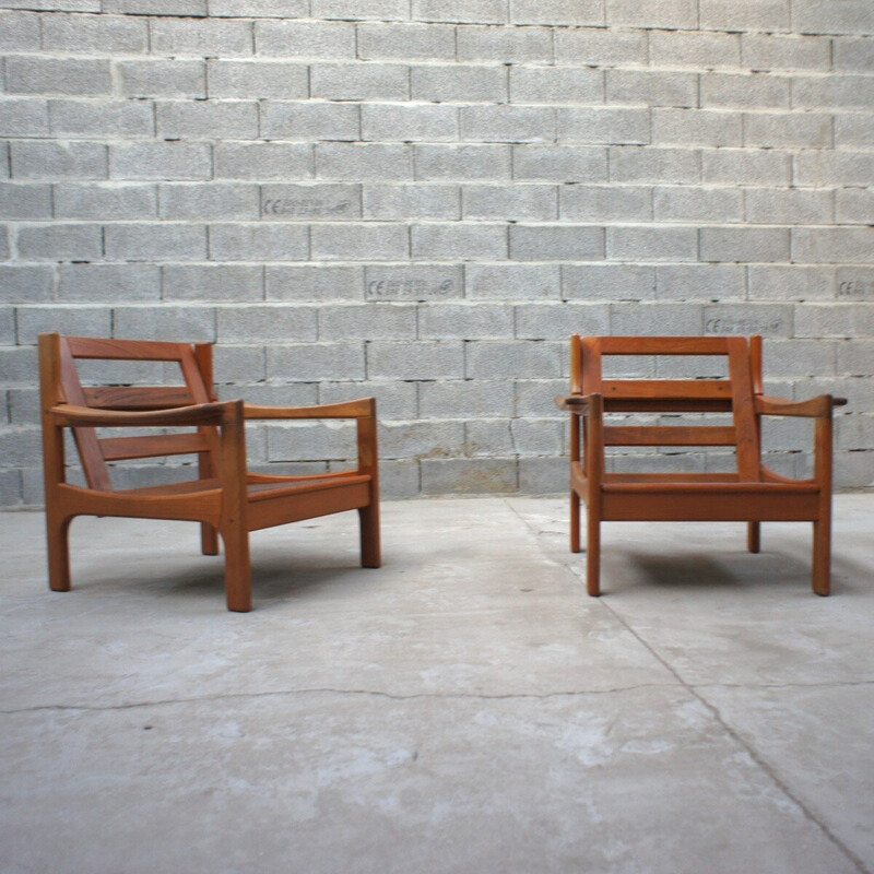 Pair of vintage solid teak armchairs