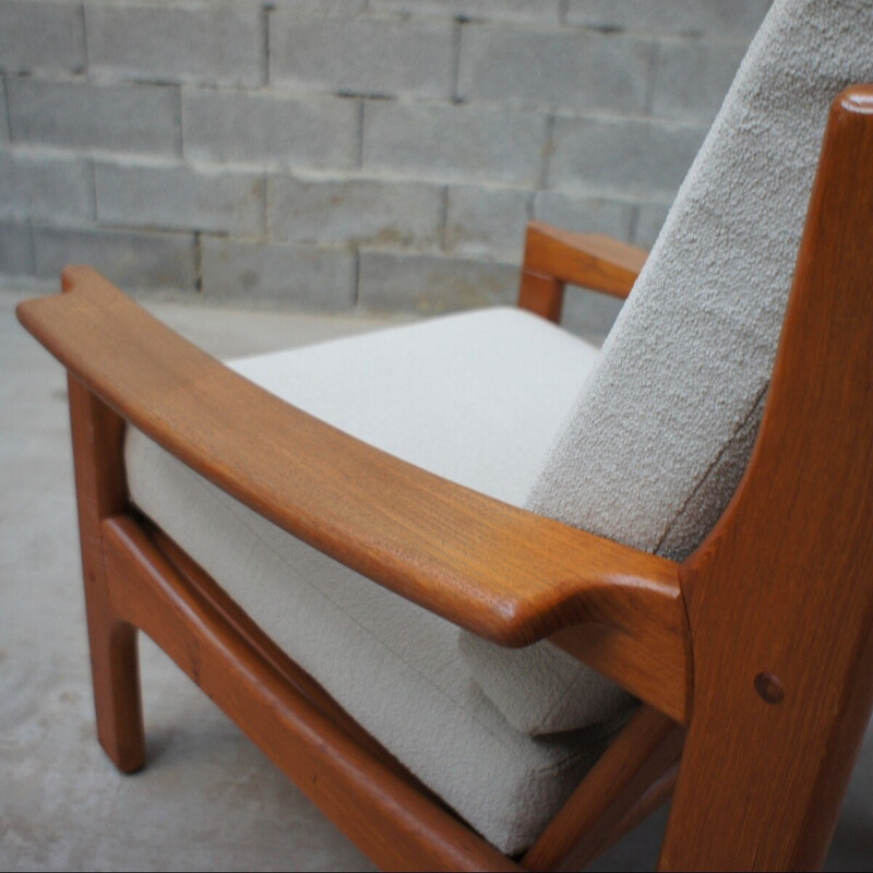 Pair of vintage solid teak armchairs