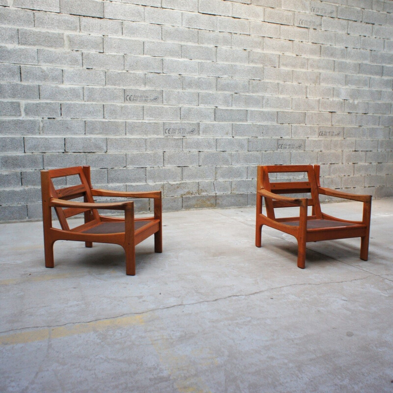 Pair of vintage solid teak armchairs