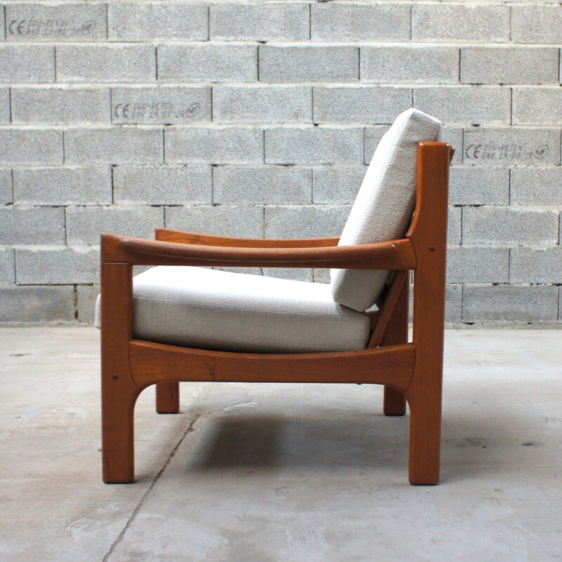 Pair of vintage solid teak armchairs