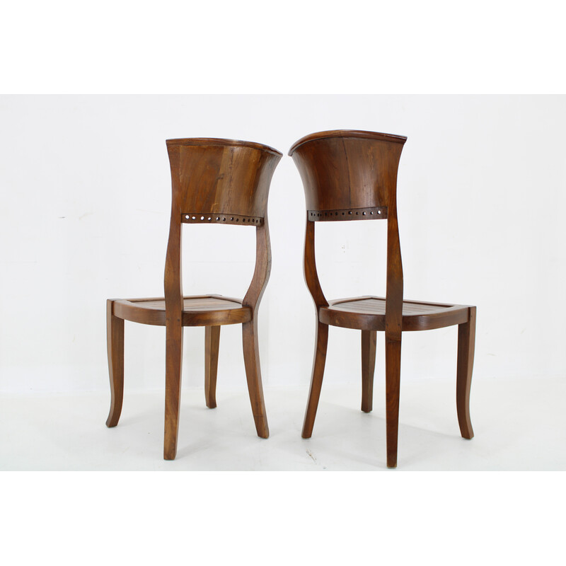 Pair of vintage solid teak chairs, India 1980