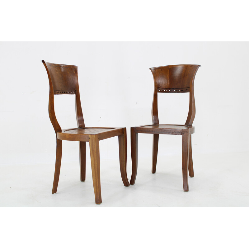 Pair of vintage solid teak chairs, India 1980