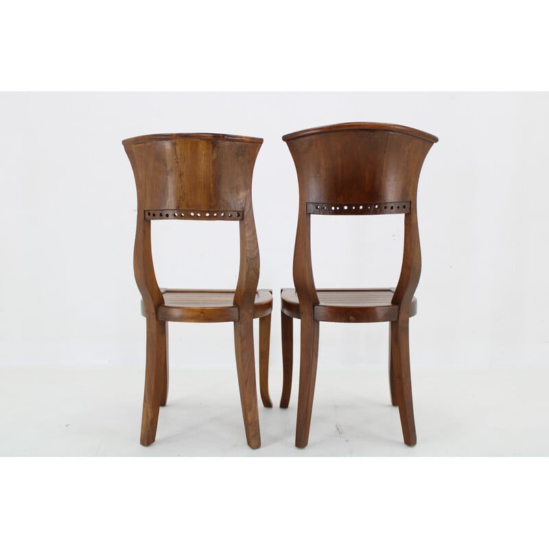 Pair of vintage solid teak chairs, India 1980