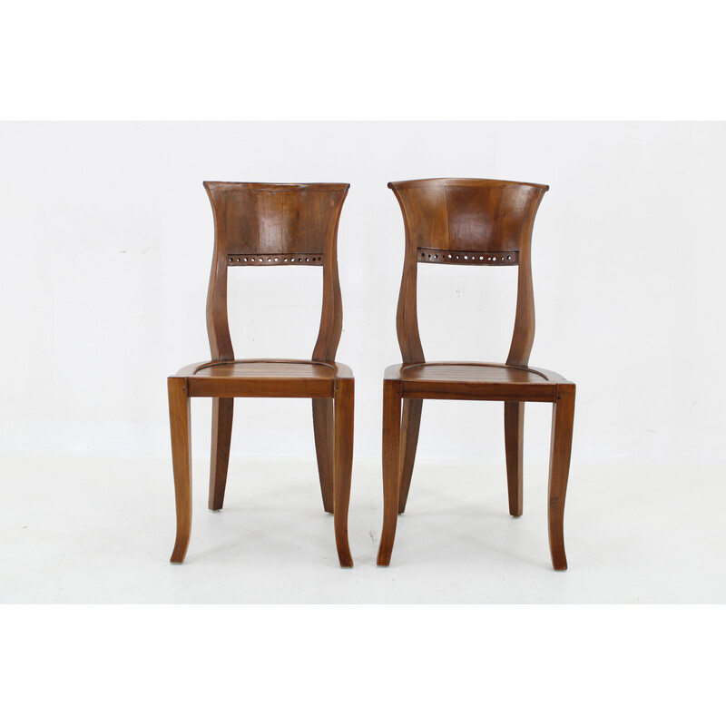 Pair of vintage solid teak chairs, India 1980