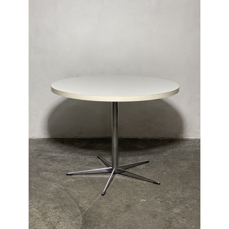 Vintage round dining table with central base in chrome steel, 1960