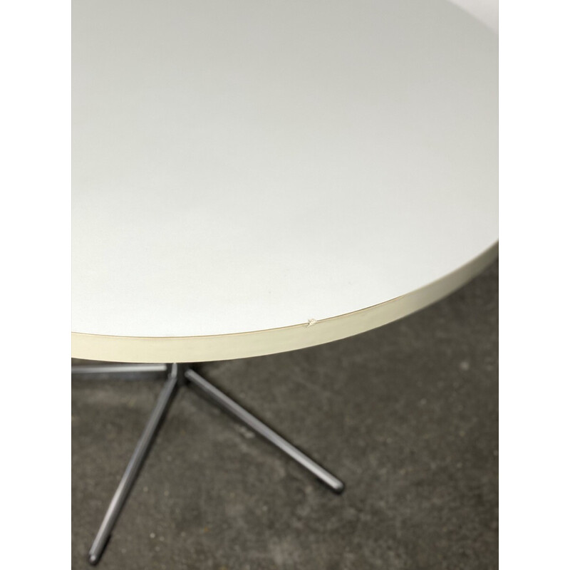 Vintage round dining table with central base in chrome steel, 1960