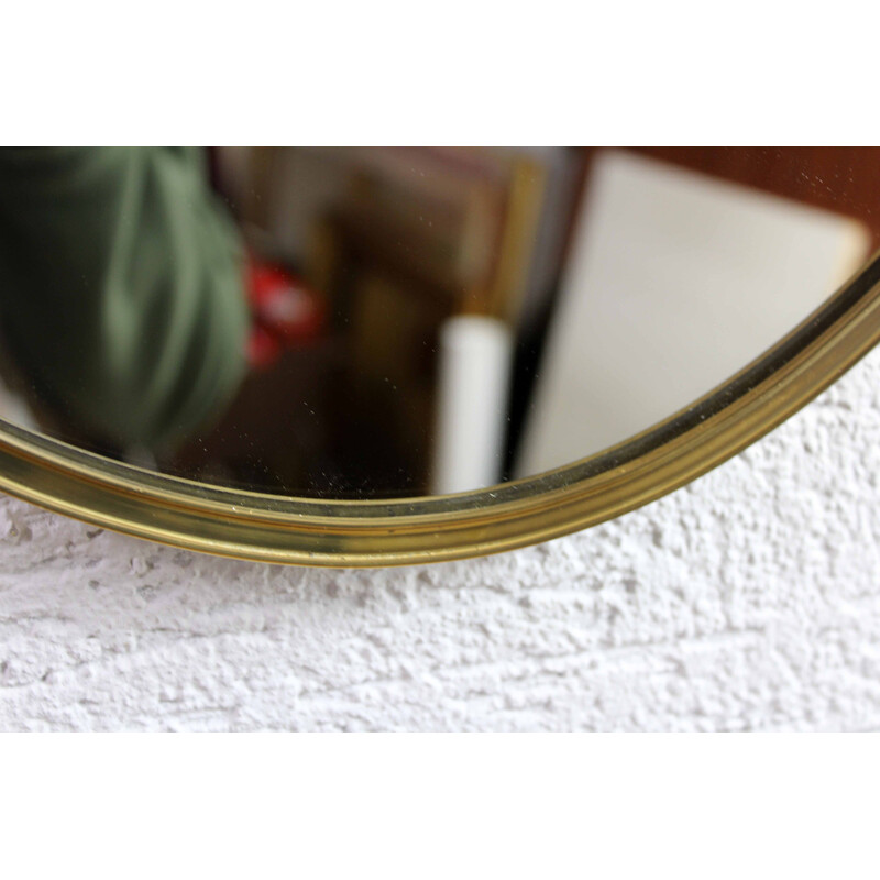 Vintage free-form mirror with brass frame, 1960