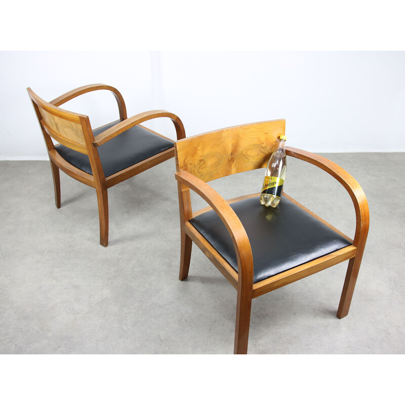 Pair of vintage Art Deco armchairs in wood and black imitation leather, Italy