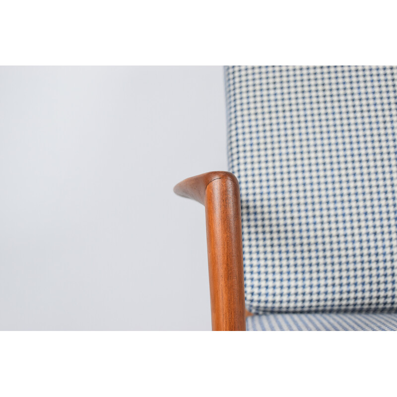 Vintage houndstooth armchair in teak stain and fabric for Swarzędz, 1960