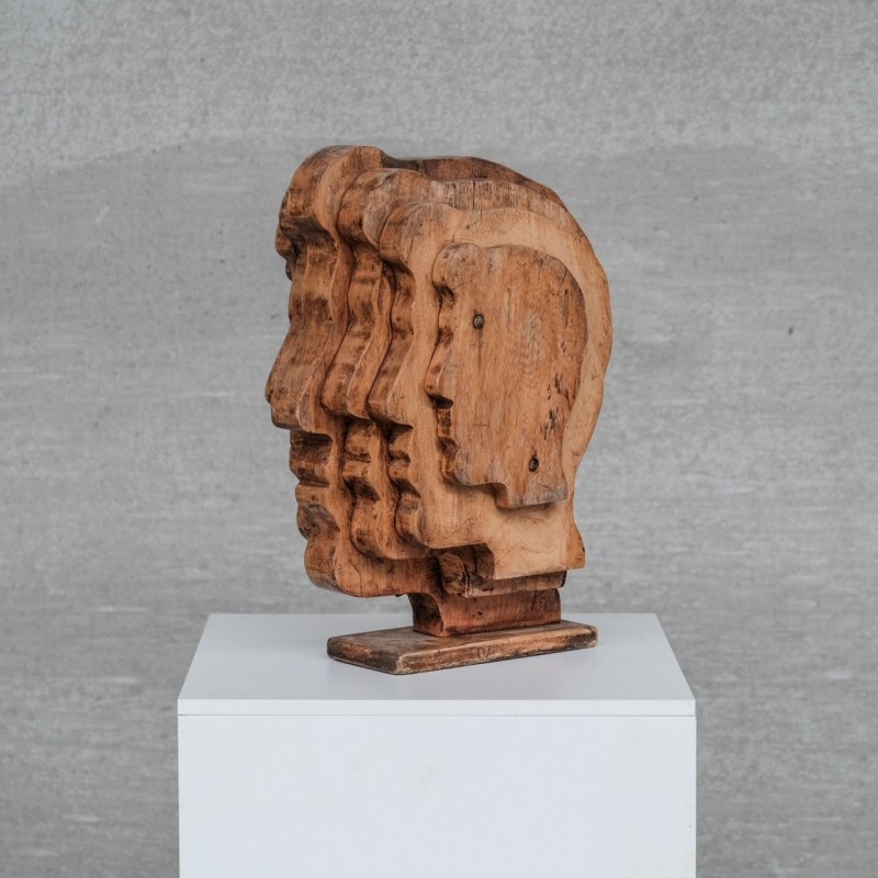 Doppelseitige Kopfskulptur aus Holz, Frankreich