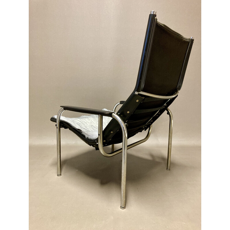 Vintage relax reclining armchairs in chrome steel and black leather, 1960