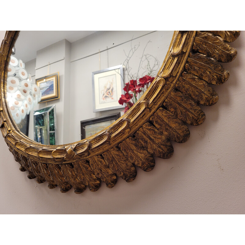 Vintage mirror in carved and gilded wooden frame