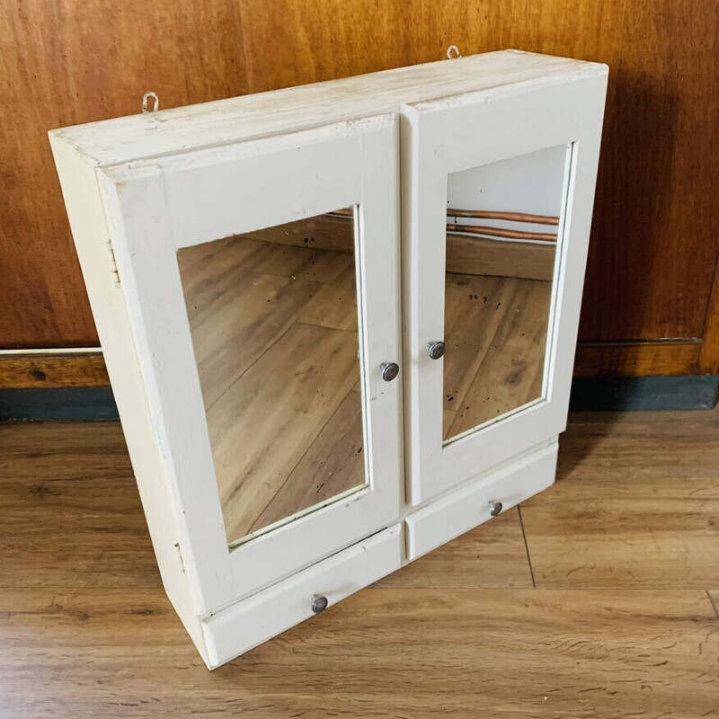 Vintage wooden medicine cabinet with mirror