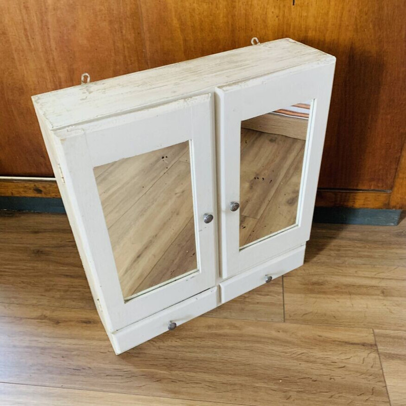 Vintage wooden medicine cabinet with mirror
