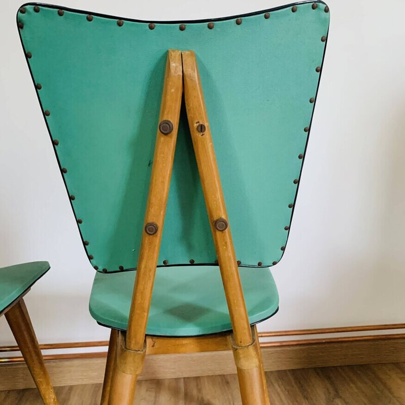 Pair of vintage chairs in light wood and green skai, 1950