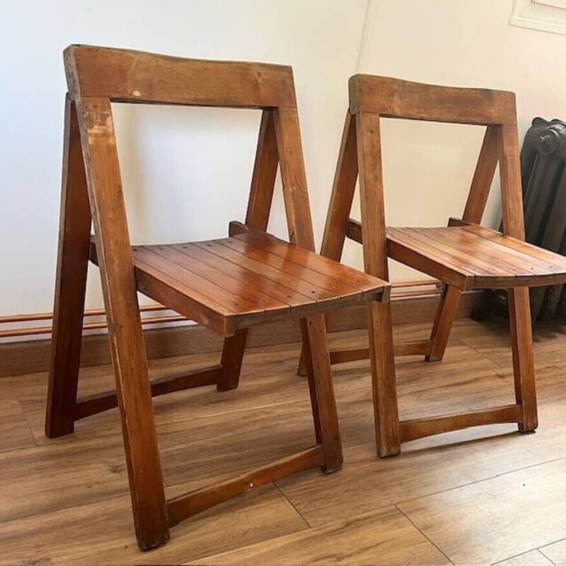 Pair of vintage folding wooden chairs