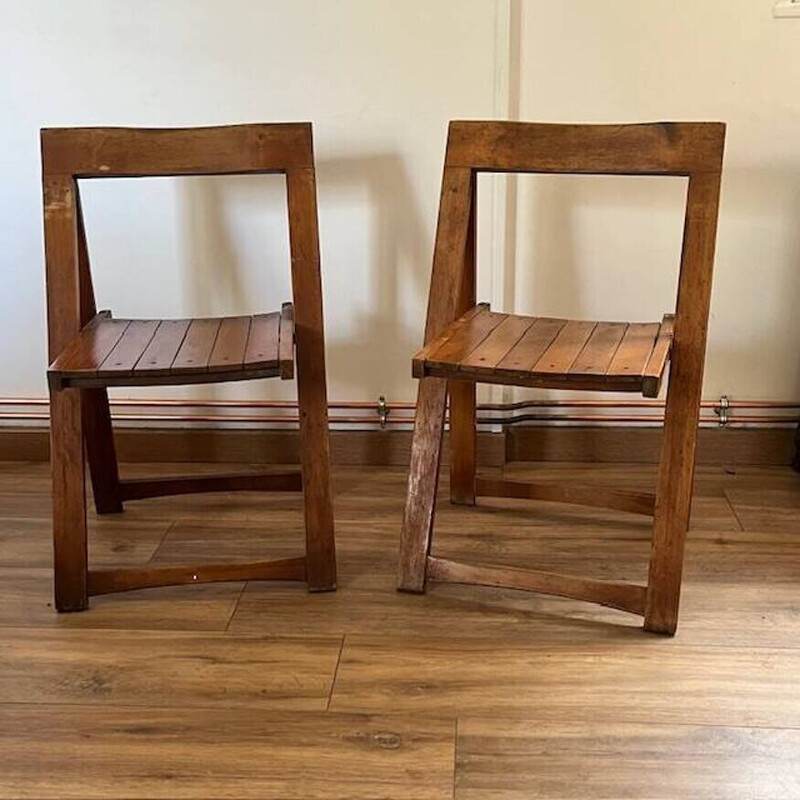 Pair of vintage folding wooden chairs