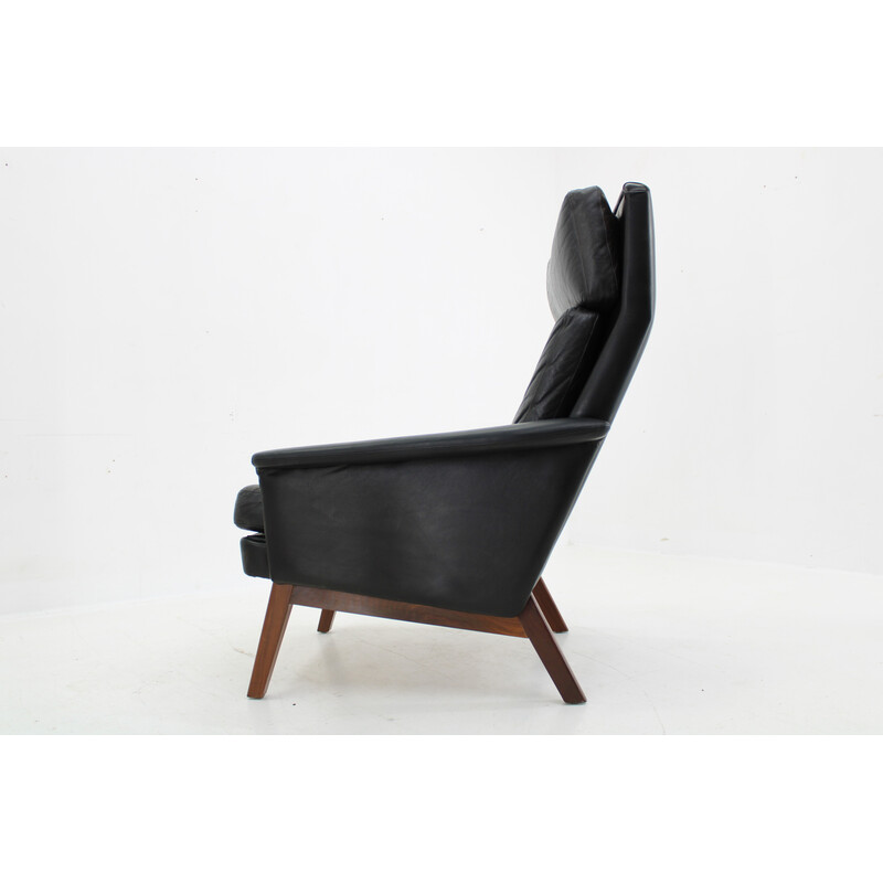 Vintage high-back armchair in leather and teak, Denmark 1970