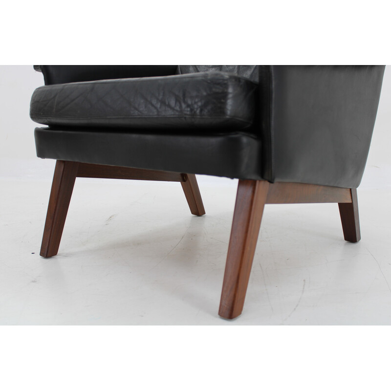 Vintage high-back armchair in leather and teak, Denmark 1970