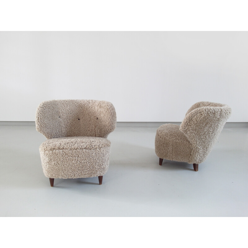 Pair of vintage sheepskin armchairs by Carl-Johan Boman for Oy Boman Ab, Finland 1940