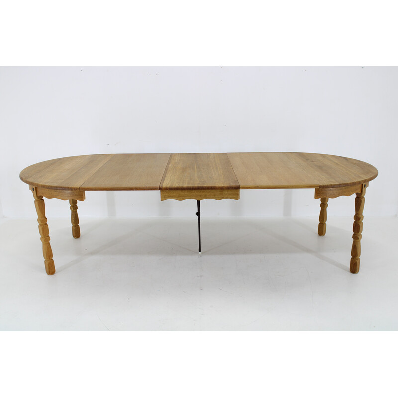 Vintage round solid oak dining table by Henning Kjaernulf, Denmark 1960