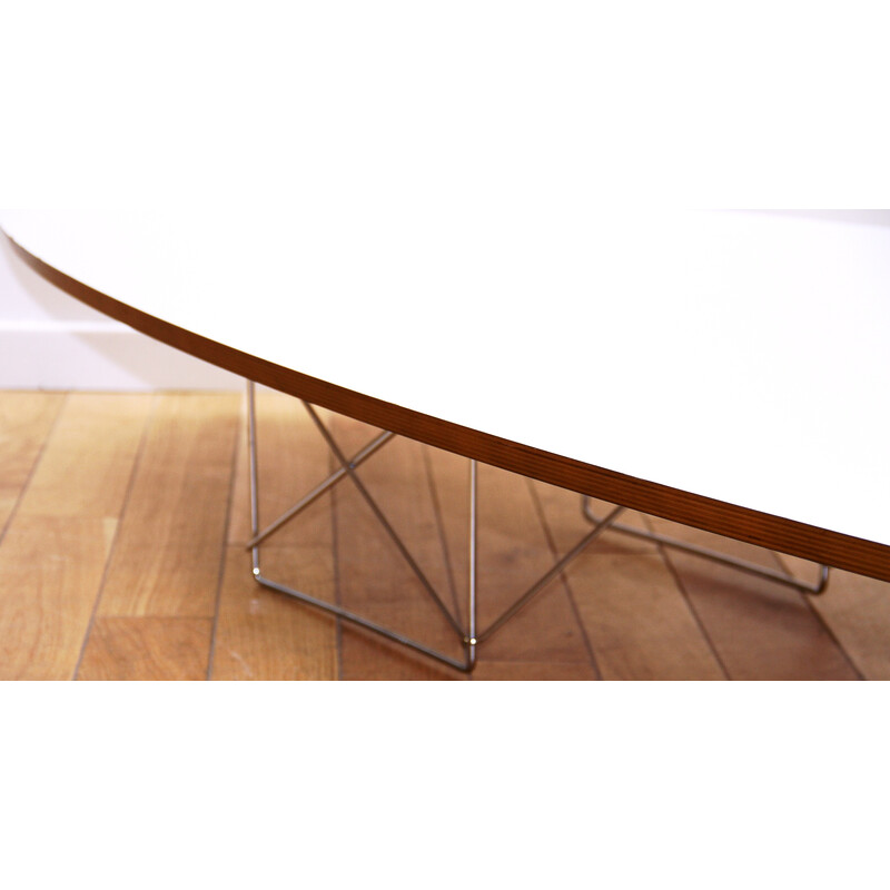 Vintage elliptical coffee table in chrome metal and white stained wood by Charles and Ray Eames for Vitra