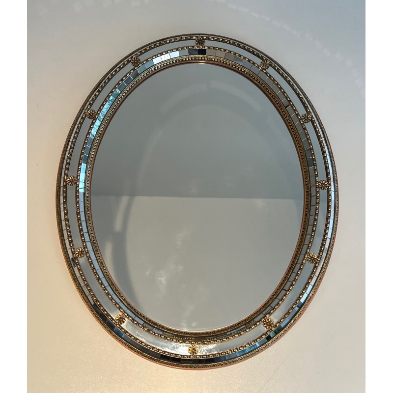 Vintage oval mirror with multi-faceted mirrors and brass garlands, France 1970