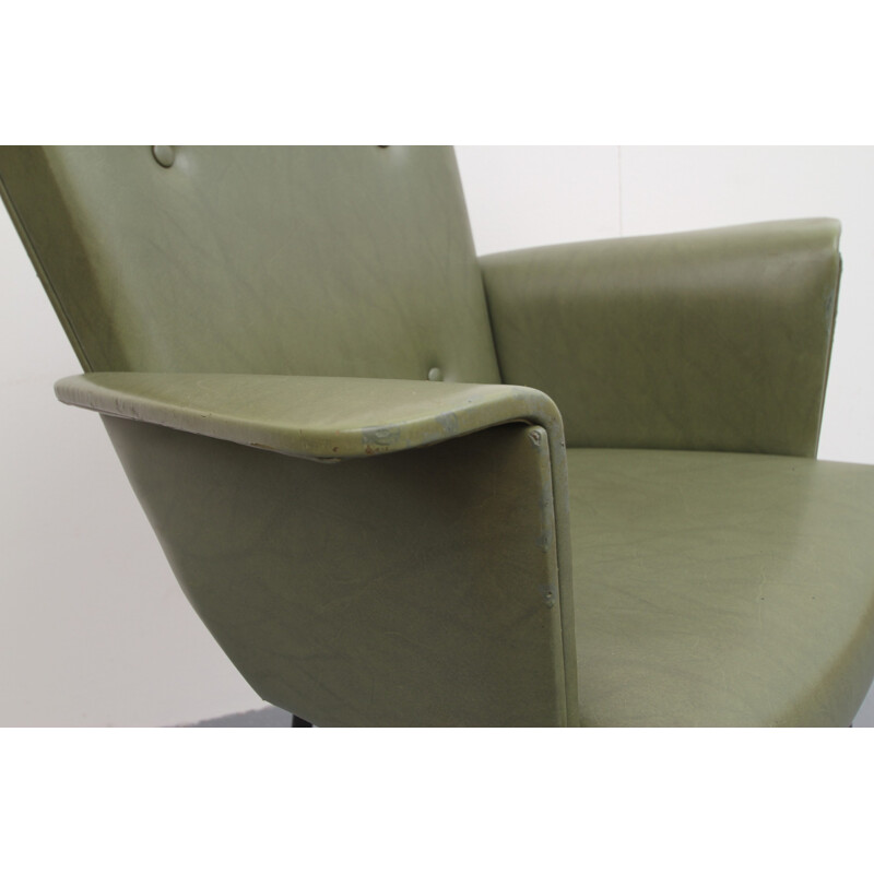 Leatherette armchair in olive-green - 1950s