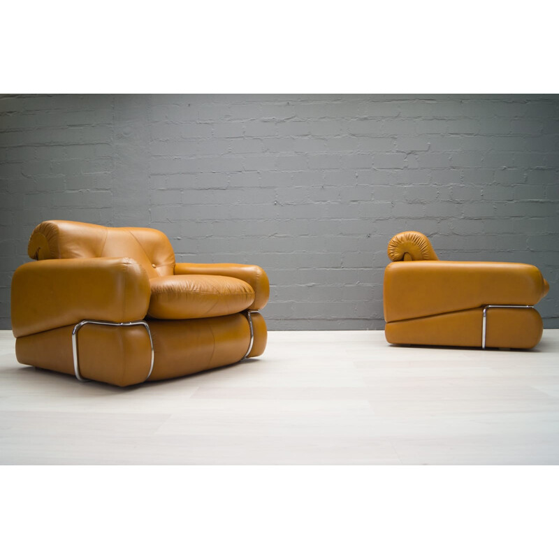 Lot de 2 fauteuils en cuir orange et en chrome - 1960