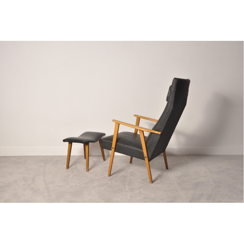 Ensemble fauteuil lounge et ottoman noirs en vynil et en chêne - 1950
