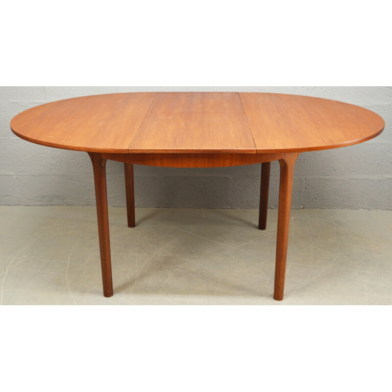 Mid-Century teak circular extendable dining Table for McIntosh 