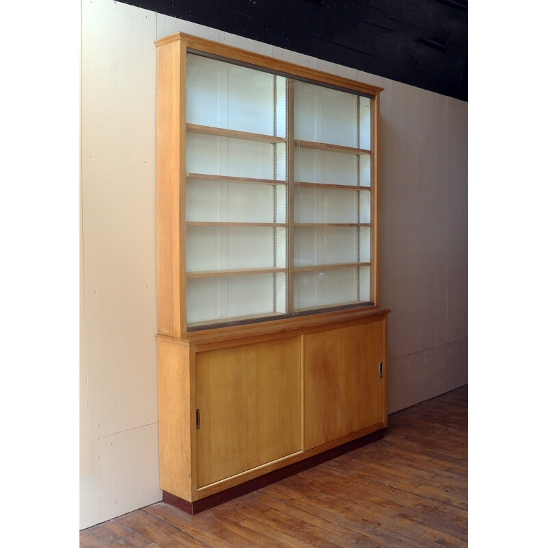 Large storage cabinet in oak with a display - 1950s