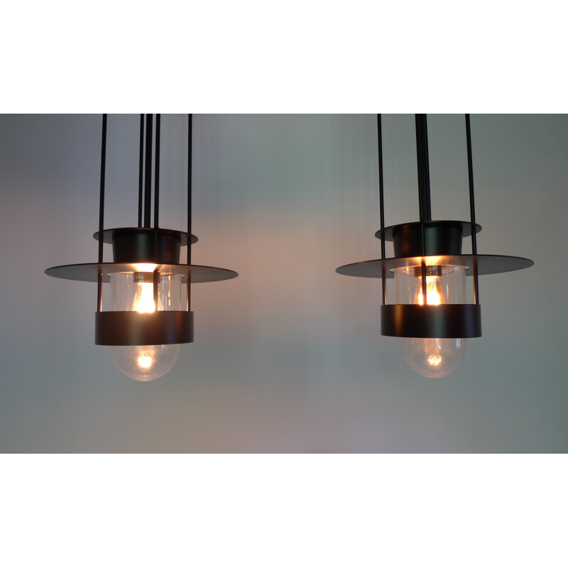 Pair of black hanging lamps in metal and glass - 1970s