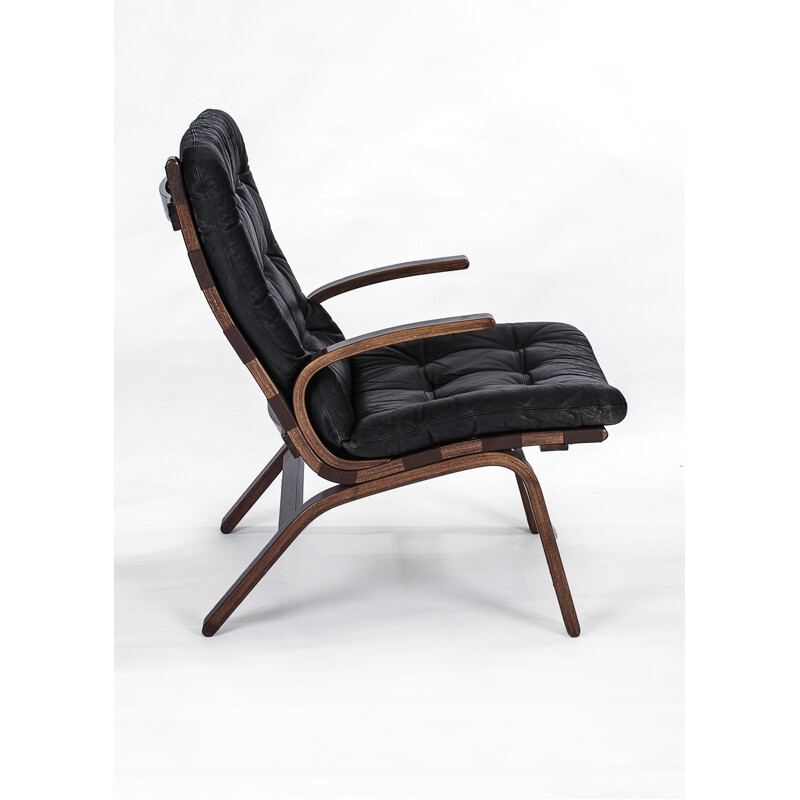 Paire de fauteuils noirs en cuir de Ingmar Relling - 1970